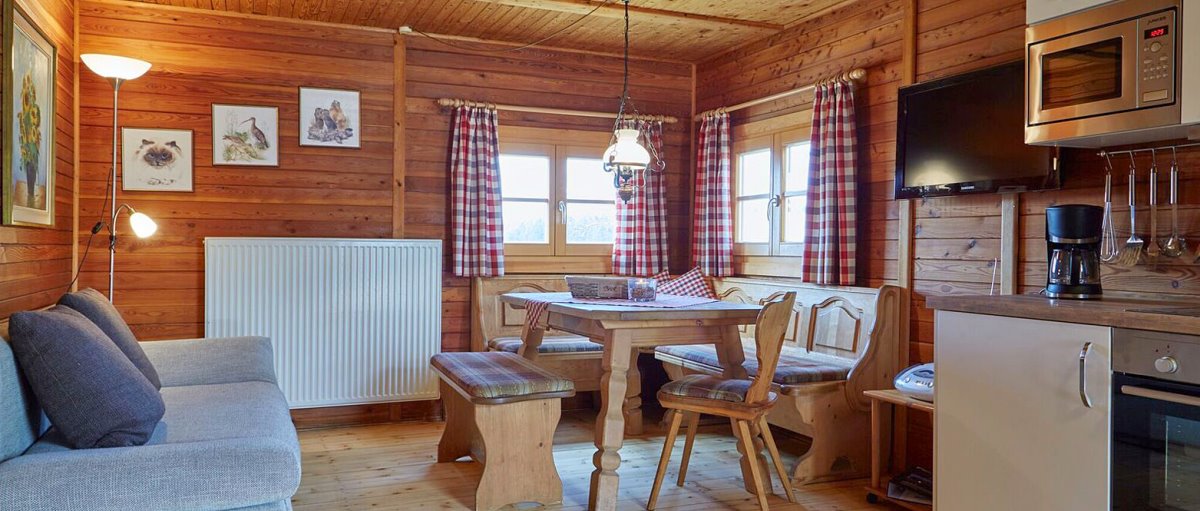 Wohnbereich in der Blockhütte am See Blockhütte am See im Dreiländereck Holzhaus Chalet innen